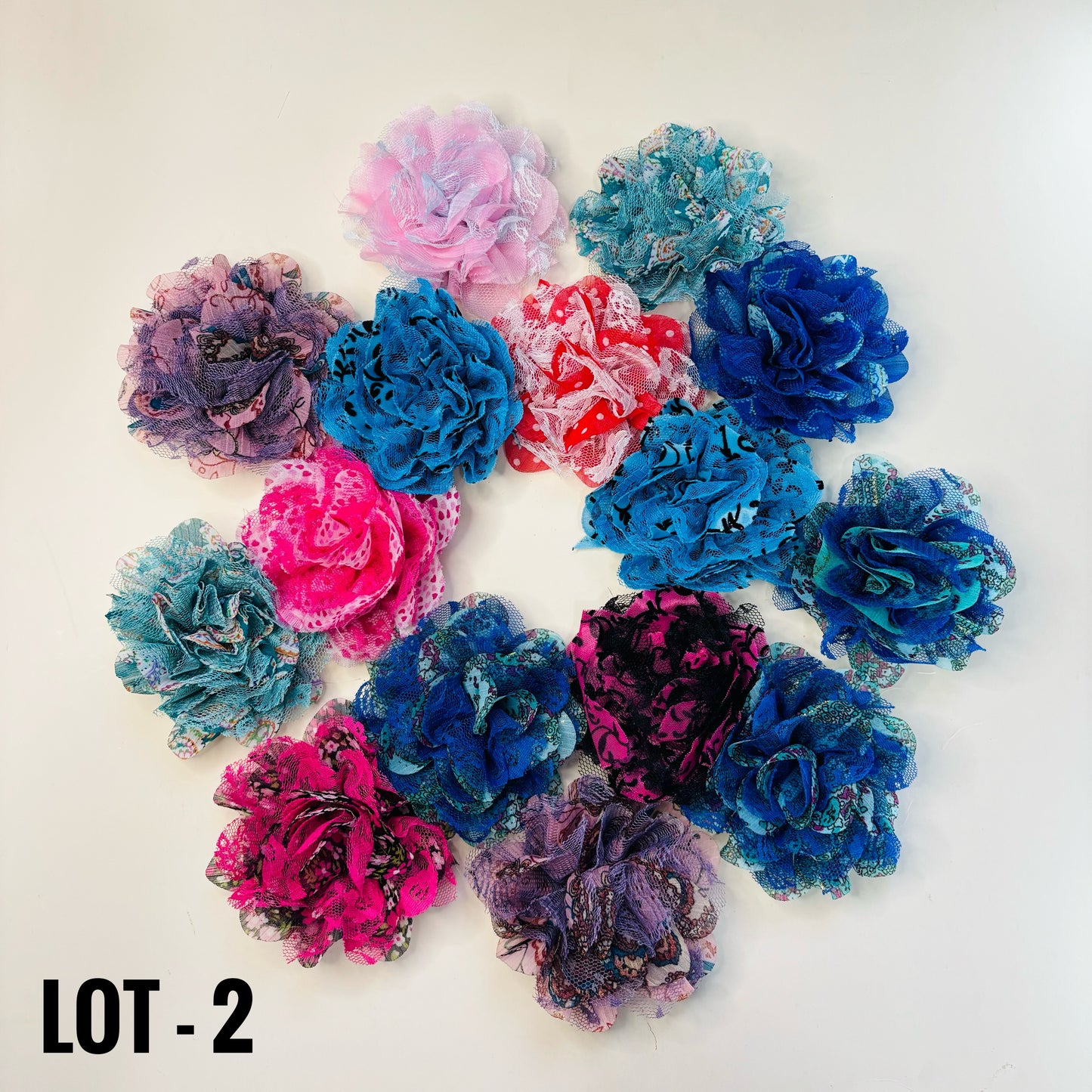FABRIC FLOWERS: Assorted colors and sizes (with and without clips/pins)