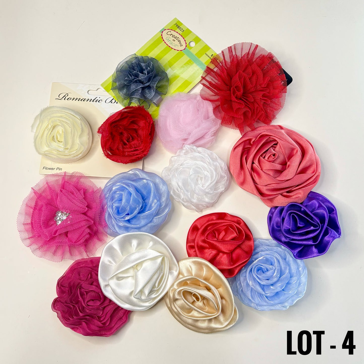 FABRIC FLOWERS: Assorted colors and sizes (with and without clips/pins)