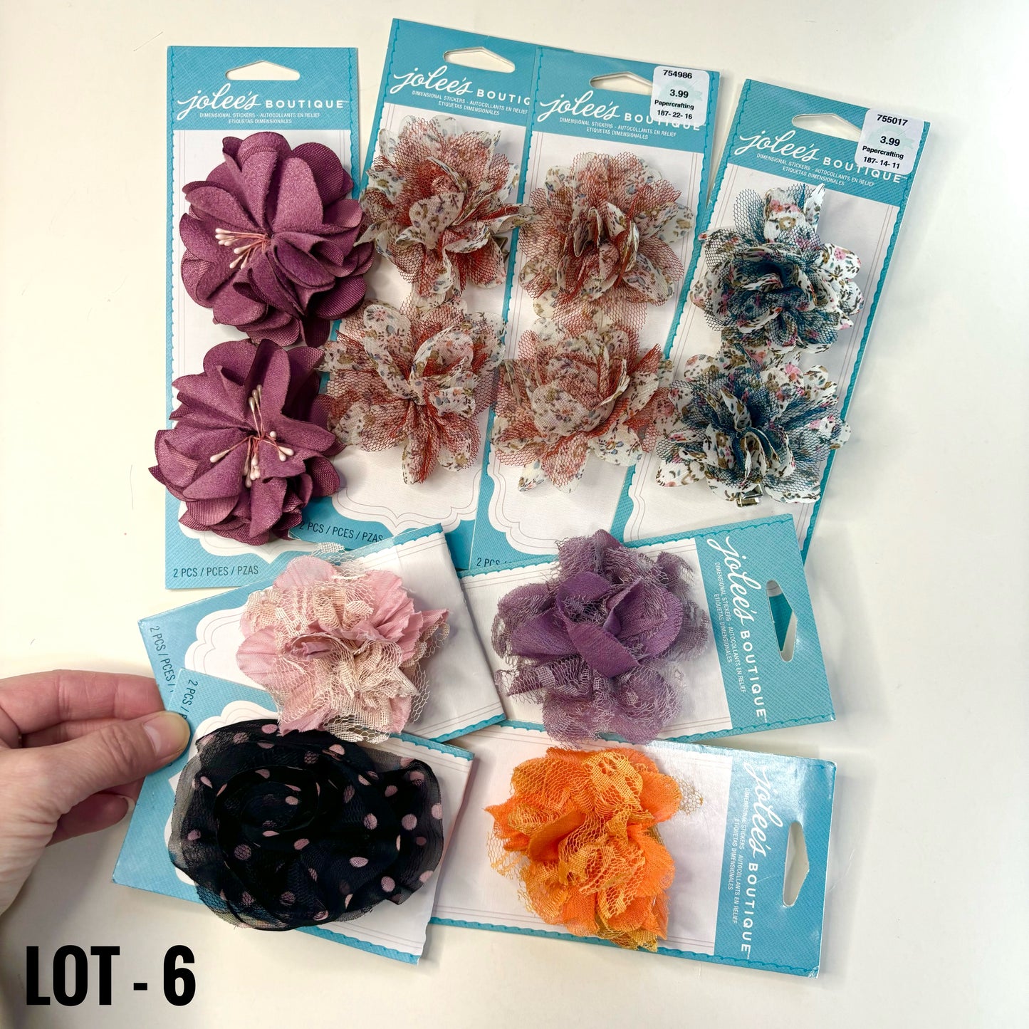 FABRIC FLOWERS: Assorted colors and sizes (with and without clips/pins)