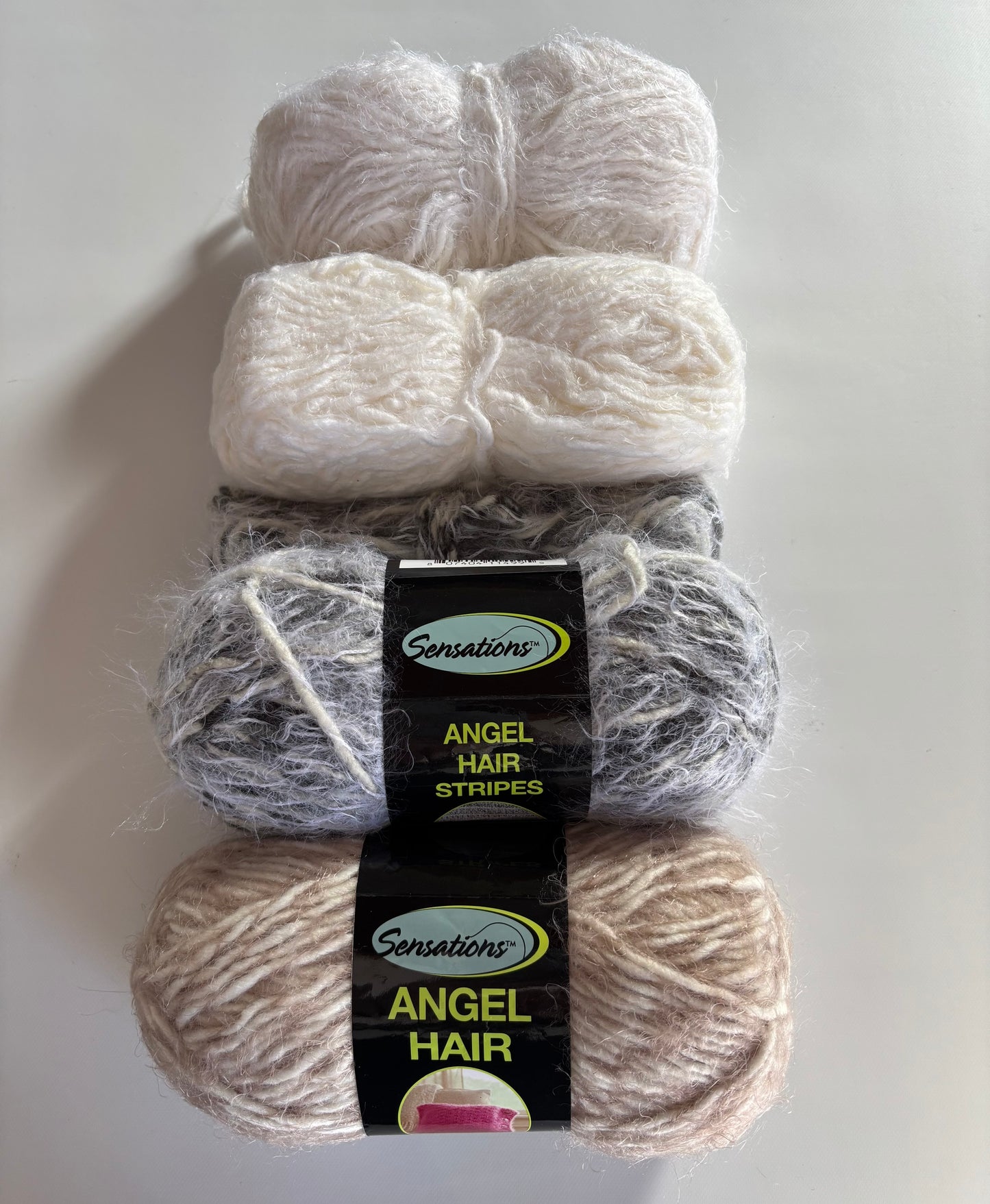 YARN (DISCONTINUED):  Sensations/Purl Essence Angel Hair Bulky Yarn (multiple colors)